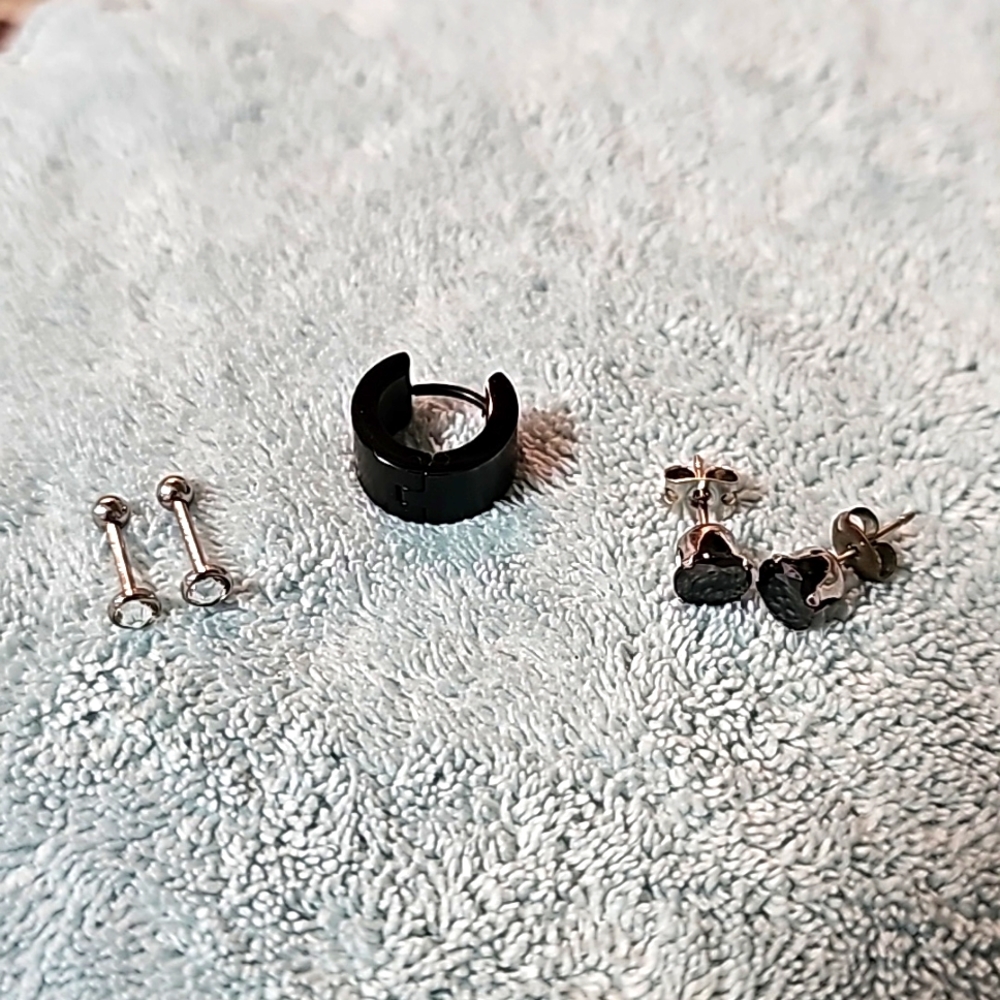 Bundled earrings and black ear cuff